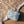 blue wet dry bag laying on beach with wave 