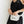 black and white bumbag on model with adjustable strap