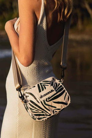 Model with crossbody bag on hip 