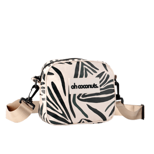 Fern pattern crossbody bag with beige and black straps