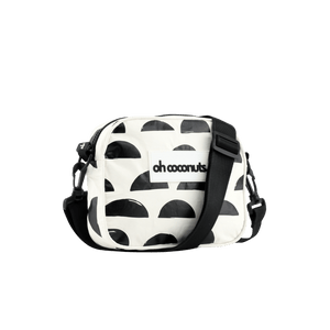 black and cream design crossbody bag with black adjustable strap