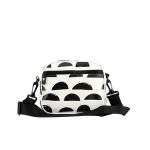 back of black and cream oh coconuts bag with black palm tree zip