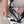 phone shown inside of black and cream bag showing oh coconuts.