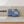 large and medium navy blue oh coconuts in modern beige bathroom