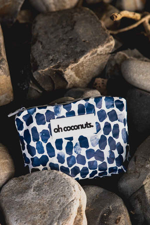 blue navy pouch oh coconuts pouch in rocks