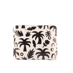 back of white and black palm tree bag 